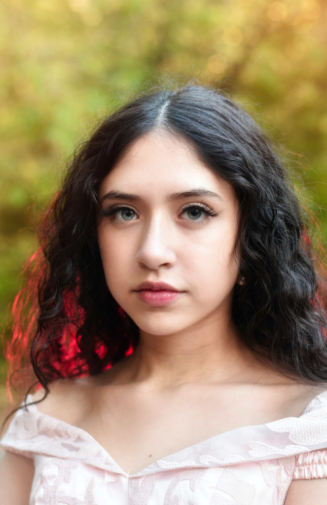 woman with black and curly hair 