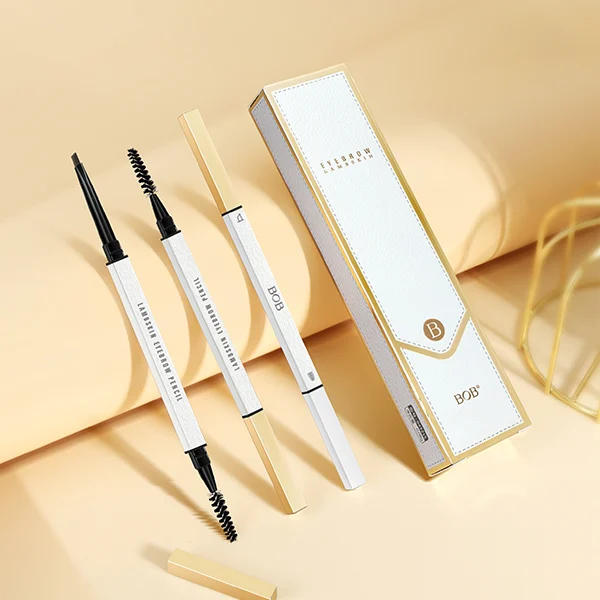 three eyebrow pencils with a box